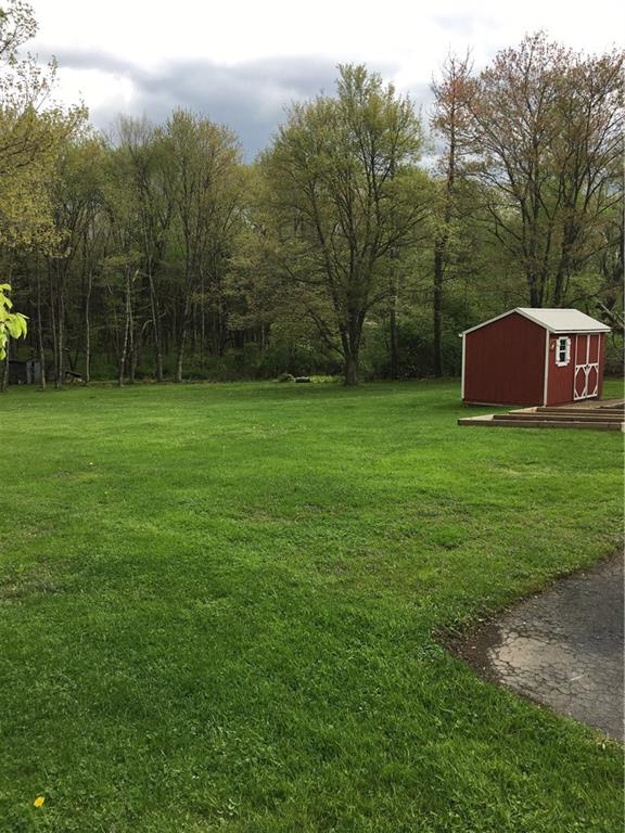 118 Beacon Road Renfrew, PA 16053 - Photo 15 of 24 Here we have the left side of the rear expansive yard with 1 of the 2 sheds included.