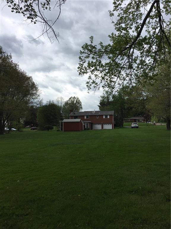 118 Beacon Road Renfrew, PA 16053 - Photo 16 of 24 Not even quite at the property line, this view shows the vastness of the rear yard.