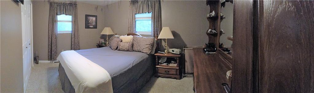 118 Beacon Road Renfrew, PA 16053 - Photo 7 of 24 Master bedroom with double size closets for his and her. This room is plenty big enough for a king size bed plus more furniture. Lighted ceiling fan also.