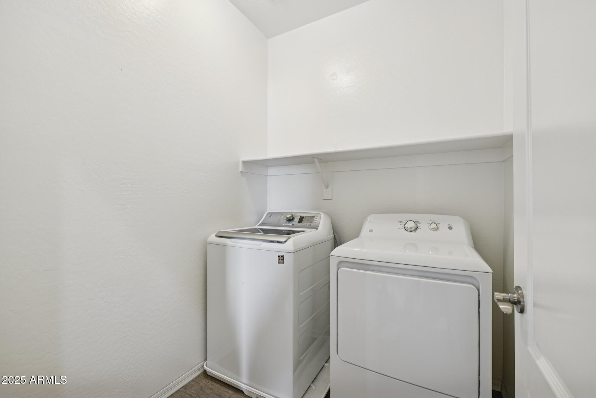 4124 East Toledo Street Gilbert, AZ 85295 - Photo 23 of 33 a utility room with dryer and washer