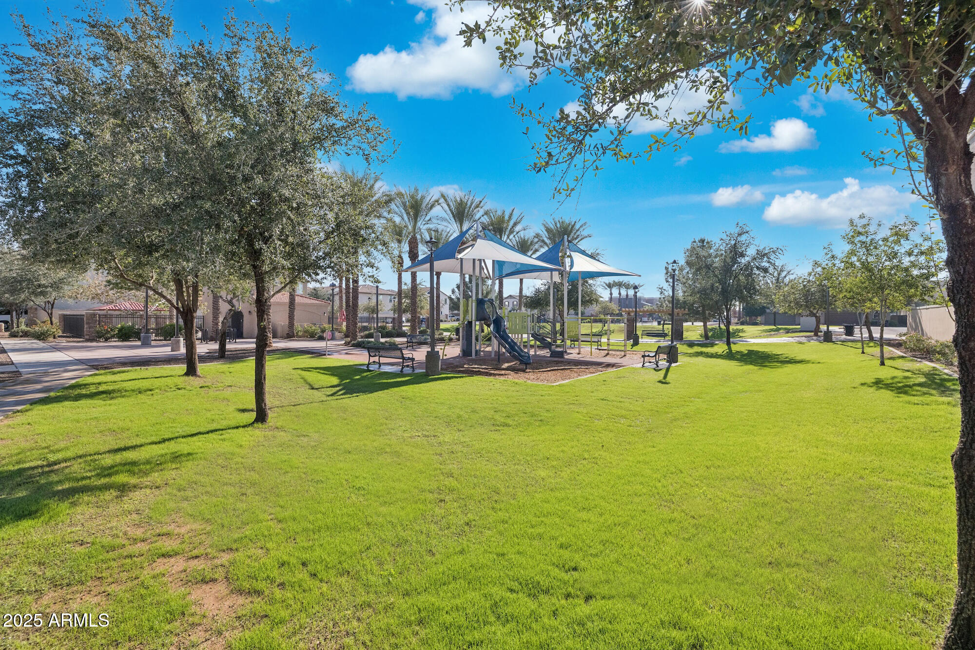 4124 East Toledo Street Gilbert, AZ 85295 - Photo 30 of 33 a view of a playground with basketball court