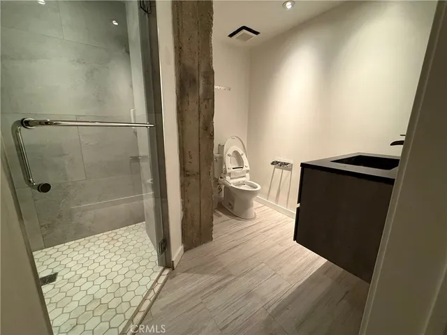 a bathroom with a sink and a shower