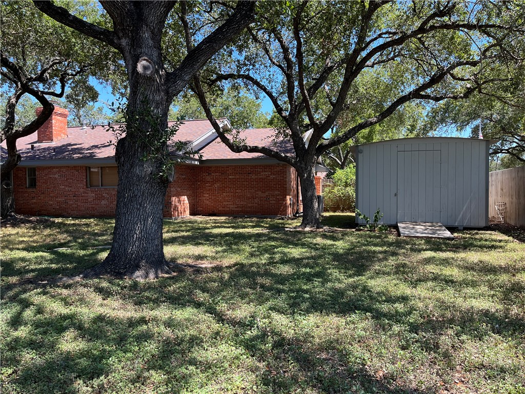 749 San Patricio Avenue Taft, TX 78390 - Photo 39 of 40 a backyard of a house with lots of green space