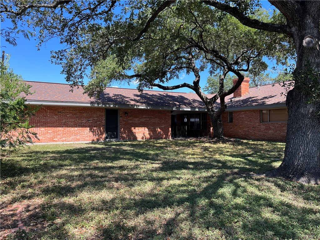 749 San Patricio Avenue Taft, TX 78390 - Photo 40 of 40 a view of a yard with a tree