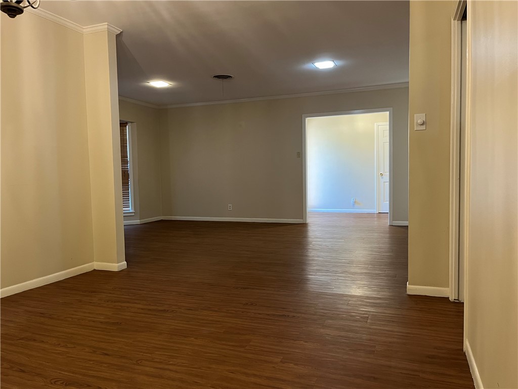 749 San Patricio Avenue Taft, TX 78390 - Photo 9 of 40 a view of a livingroom with wooden floor