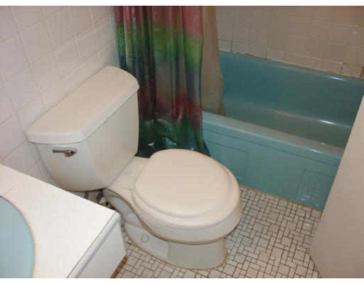 141 Lake Shore Road, Unit 3 Boston, MA 02135 - Photo 12 of 20 a bathroom with a toilet and a sink