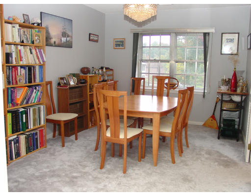 141 Lake Shore Road, Unit 3 Boston, MA 02135 - Photo 3 of 20 a view of a dining room with furniture