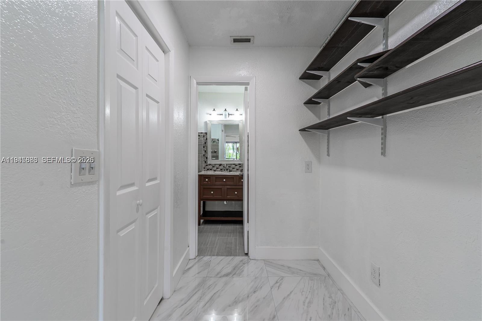 1031 Adams Avenue, Unit 1031I Homestead, FL 33034 - Photo 12 of 33 a view of closet area