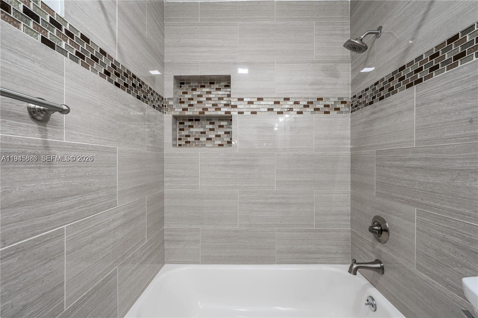 1031 Adams Avenue, Unit 1031I Homestead, FL 33034 - Photo 20 of 33 a bathroom with a shower