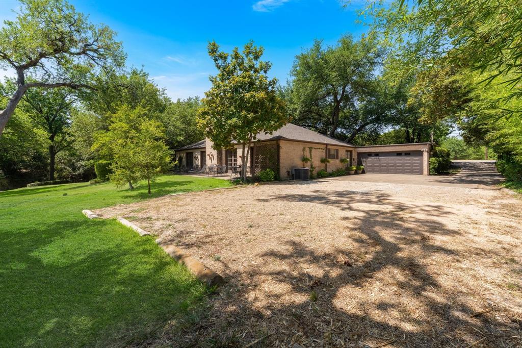 13828 Hillcrest Road Dallas, TX 75240 - Photo 31 of 34 Extra Parking in the back along with 2 car garage.