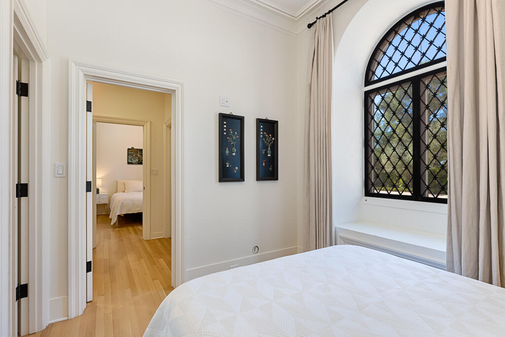 801 Riven Rock Road Montecito, CA 93108 - Photo 12 of 33 a bedroom with a bed and a window