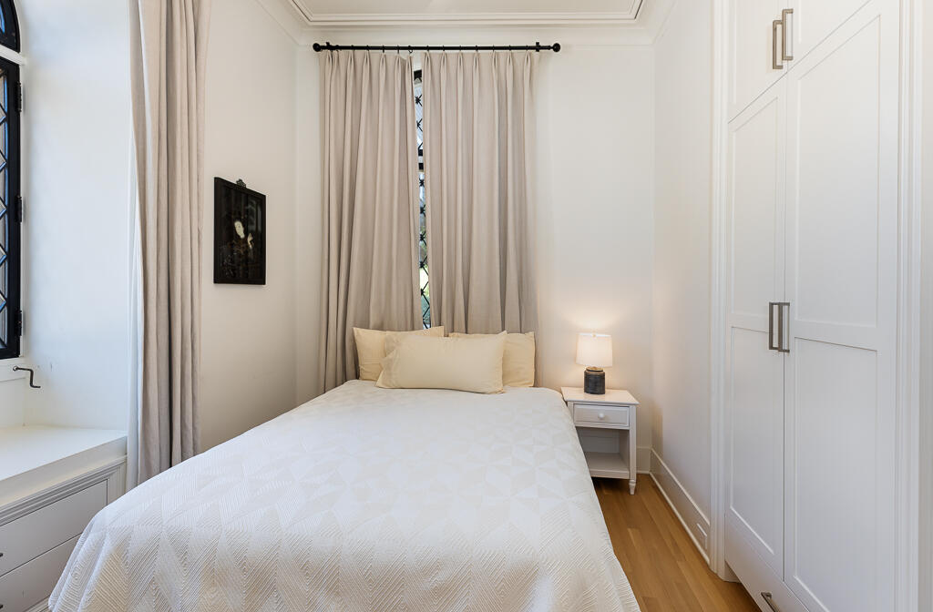 801 Riven Rock Road Montecito, CA 93108 - Photo 13 of 33 a bedroom with a bed and a mirror