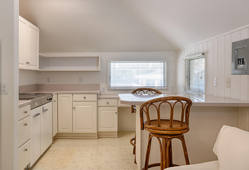 801 Riven Rock Road Montecito, CA 93108 - Photo 18 of 33 a kitchen with stainless steel appliances a stove a sink and a refrigerator