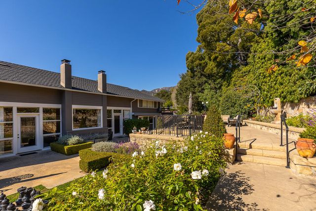 a view of balcony with furniture