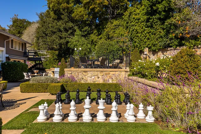 a view from deck with patio