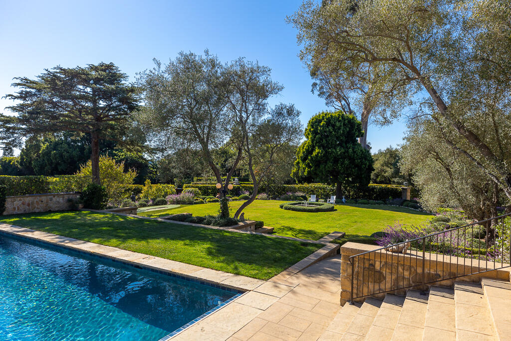 801 Riven Rock Road Montecito, CA 93108 - Photo 26 of 33 a view of a backyard with swimming pool and sitting area