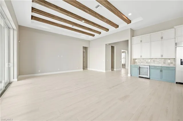 a front view of house with yard and outdoor seating