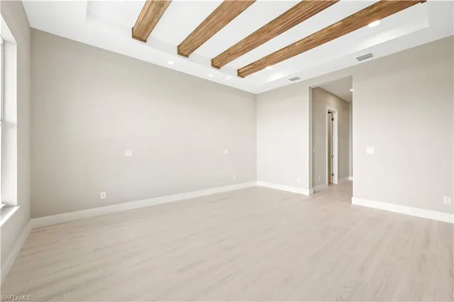 a view of a garden with lawn chairs