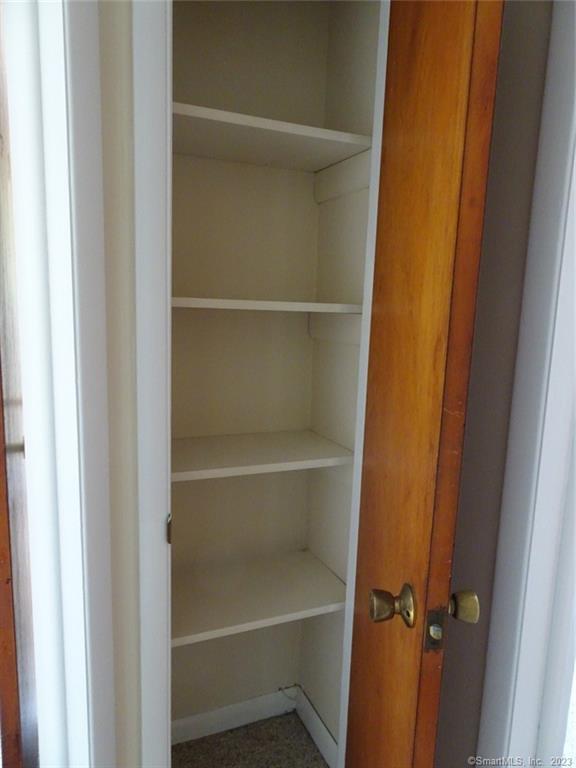 7 Eclipse Avenue, Unit B Norwalk, CT 06851 - Photo 13 of 14 a view of walk in closet with empty racks