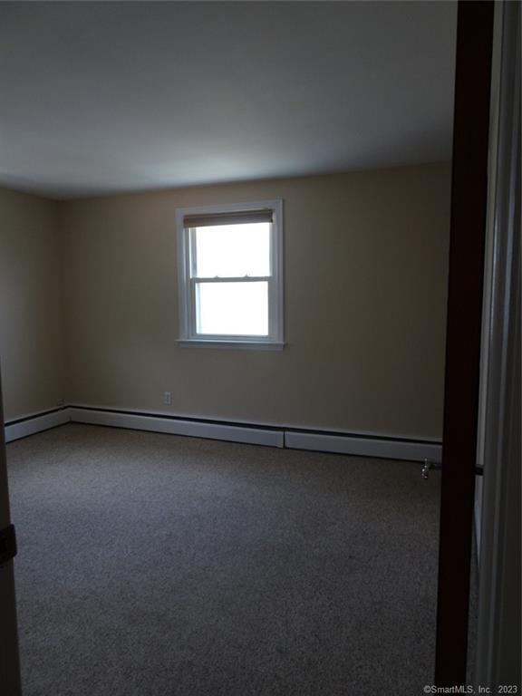 7 Eclipse Avenue, Unit B Norwalk, CT 06851 - Photo 7 of 14 a view of an empty room with a window