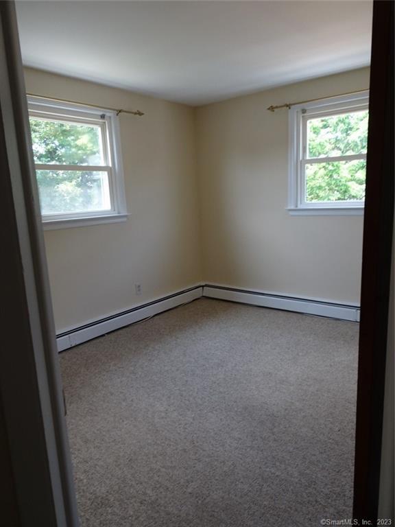 7 Eclipse Avenue, Unit B Norwalk, CT 06851 - Photo 10 of 14 an empty room with a window