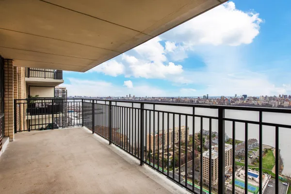 a hallway with a washer and dryer