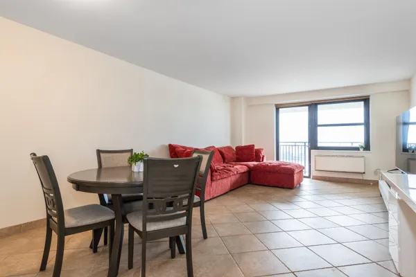 a view of a dining room with furniture