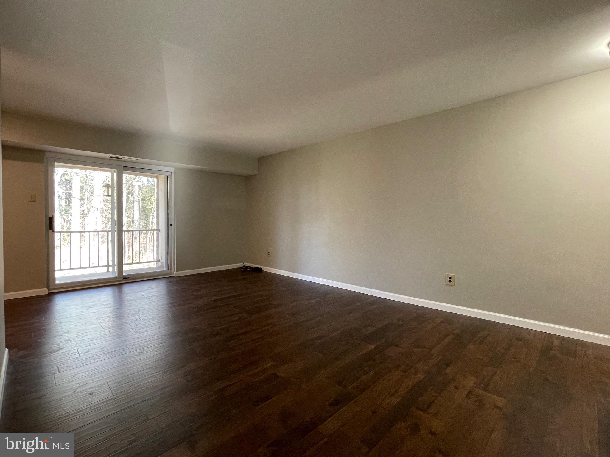 21 Shannon Road North Wales, PA 19454 - Photo 3 of 22 an empty room with wooden floor and windows