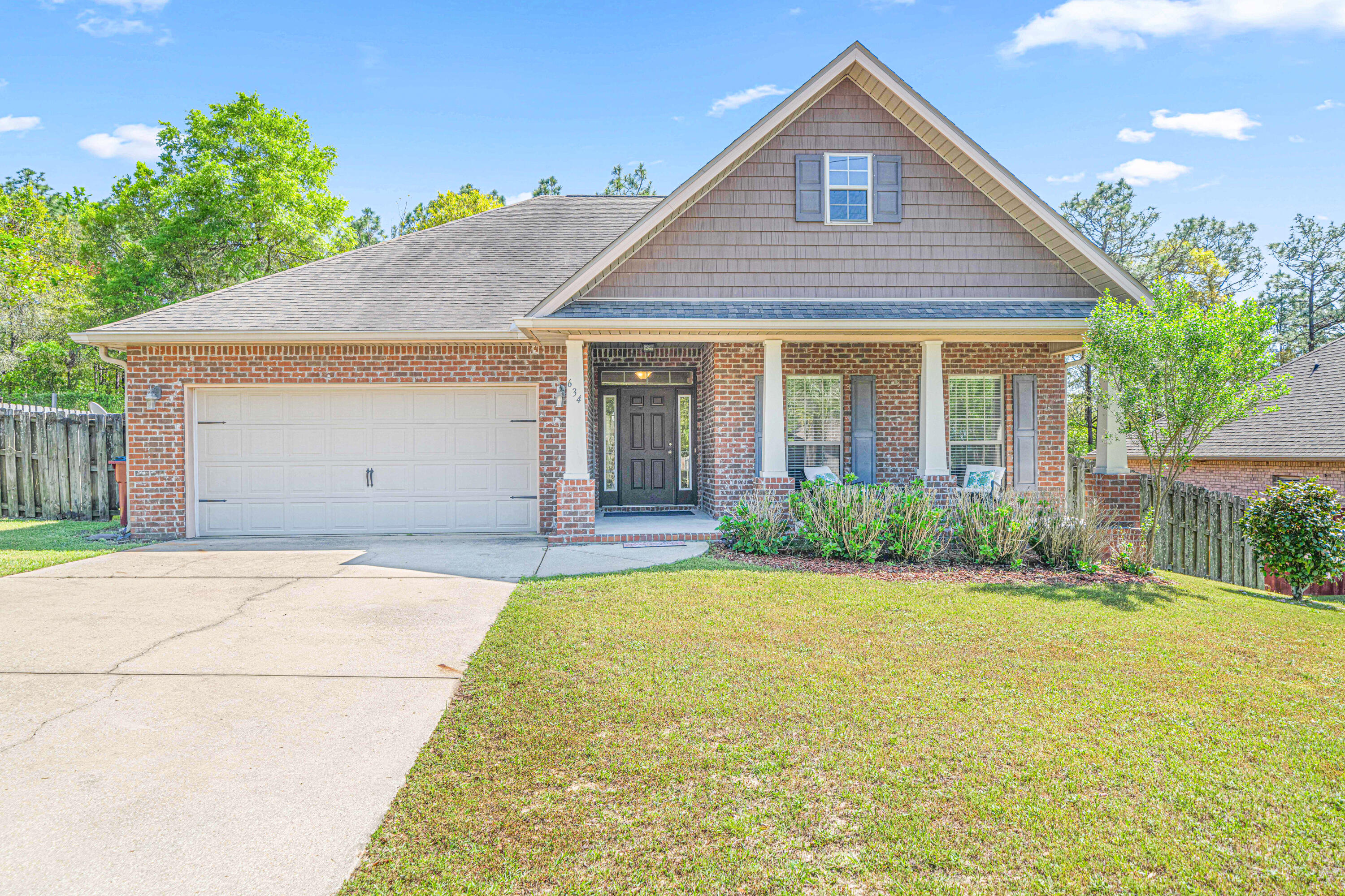 634 Red Fern Road Crestview, FL 32536 - Photo 1 of 21 front view of a house with a yard