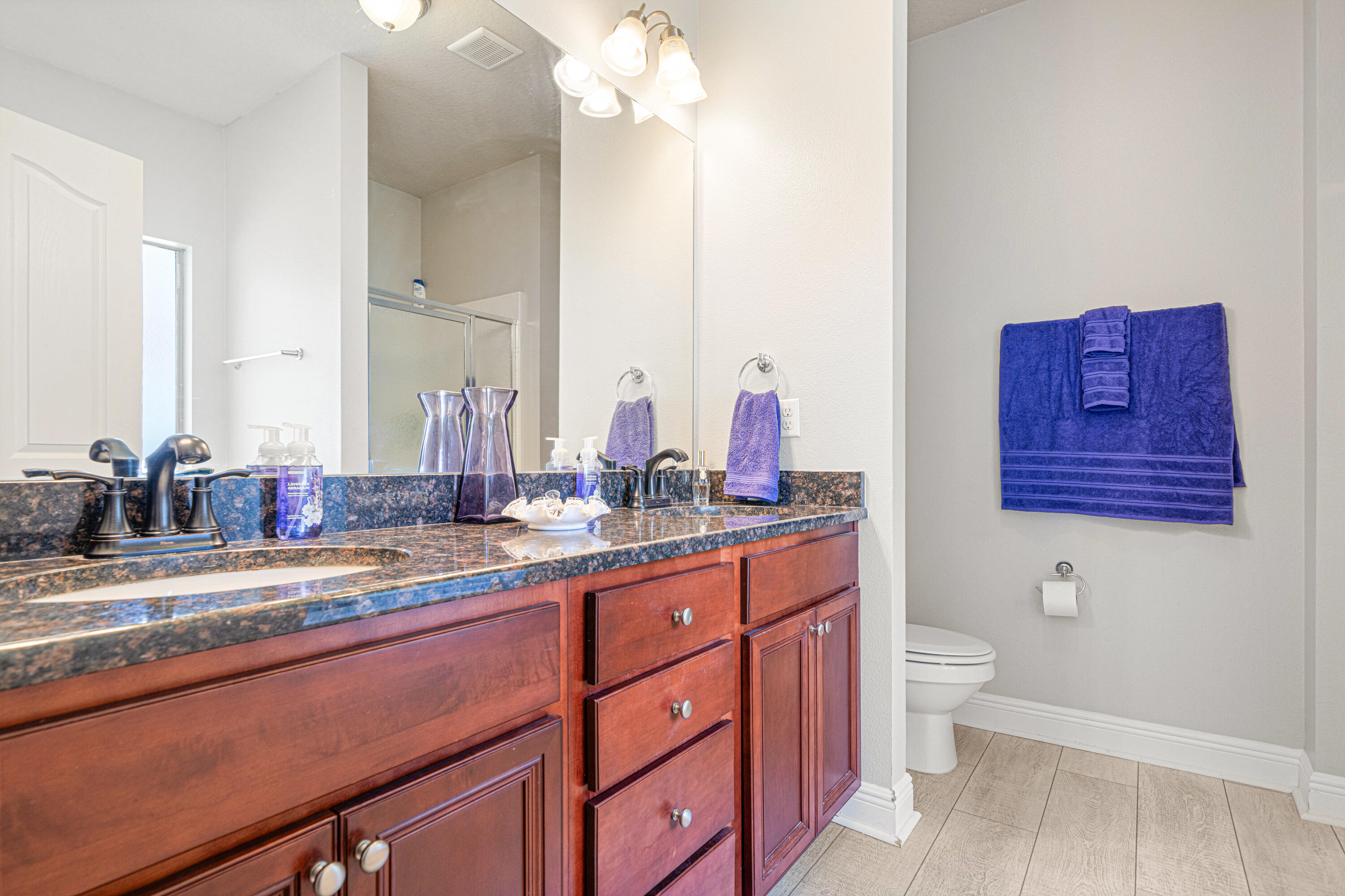 634 Red Fern Road Crestview, FL 32536 - Photo 12 of 21 a bathroom with a granite countertop sink and a mirror