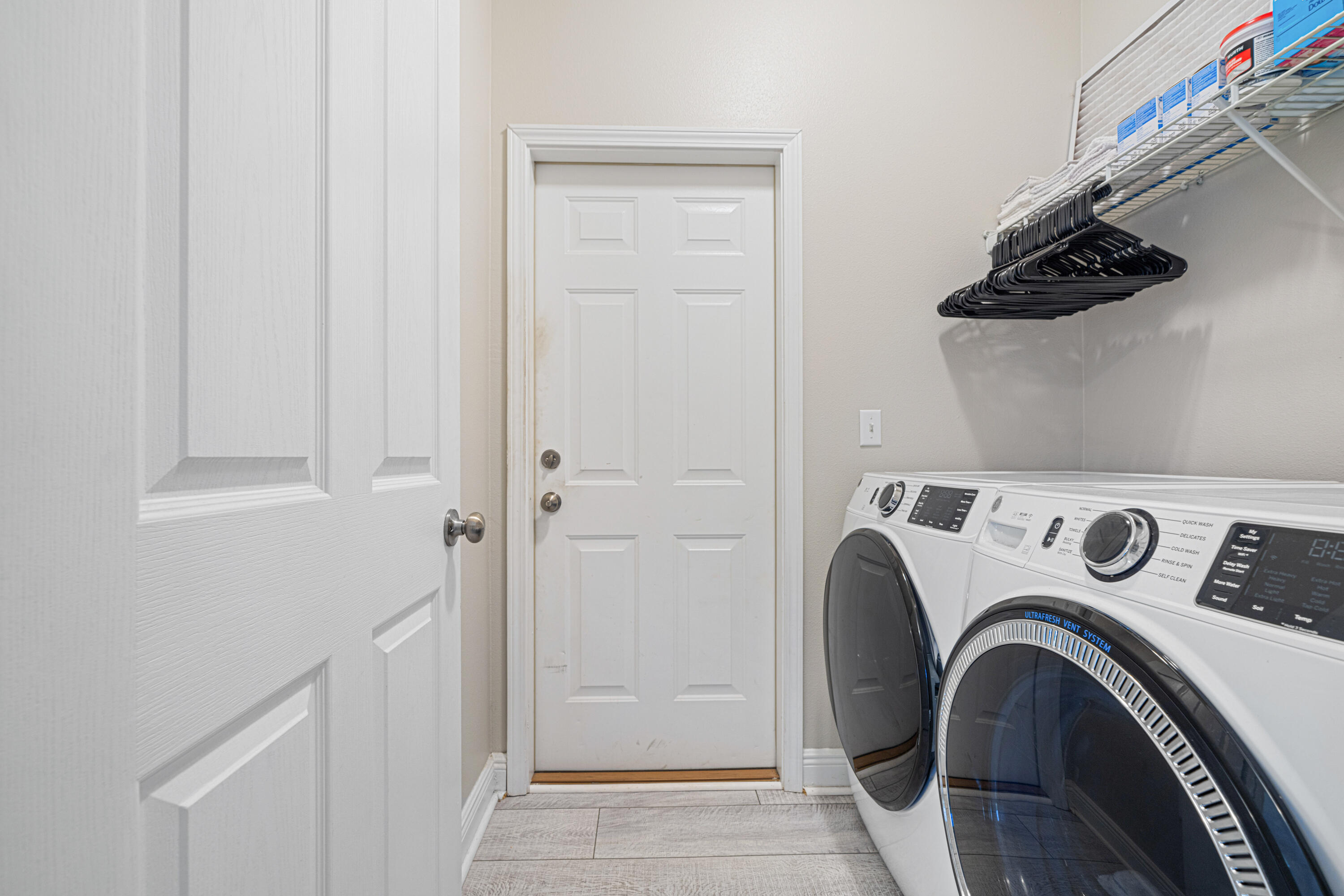 634 Red Fern Road Crestview, FL 32536 - Photo 18 of 21 a view of storage and utility room with washer and dryer