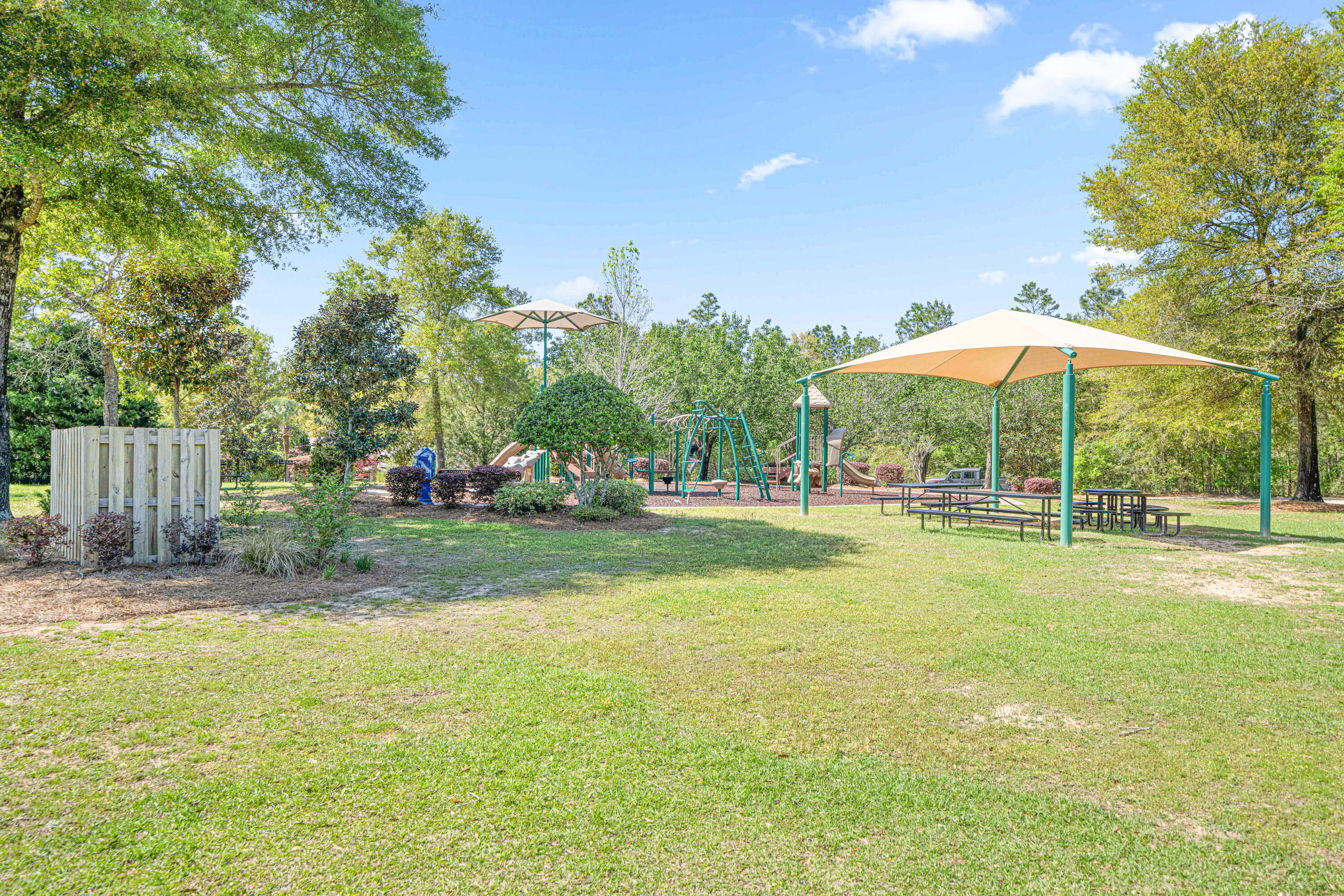 634 Red Fern Road Crestview, FL 32536 - Photo 21 of 21 a view of a swimming pool with an outdoor space and seating area