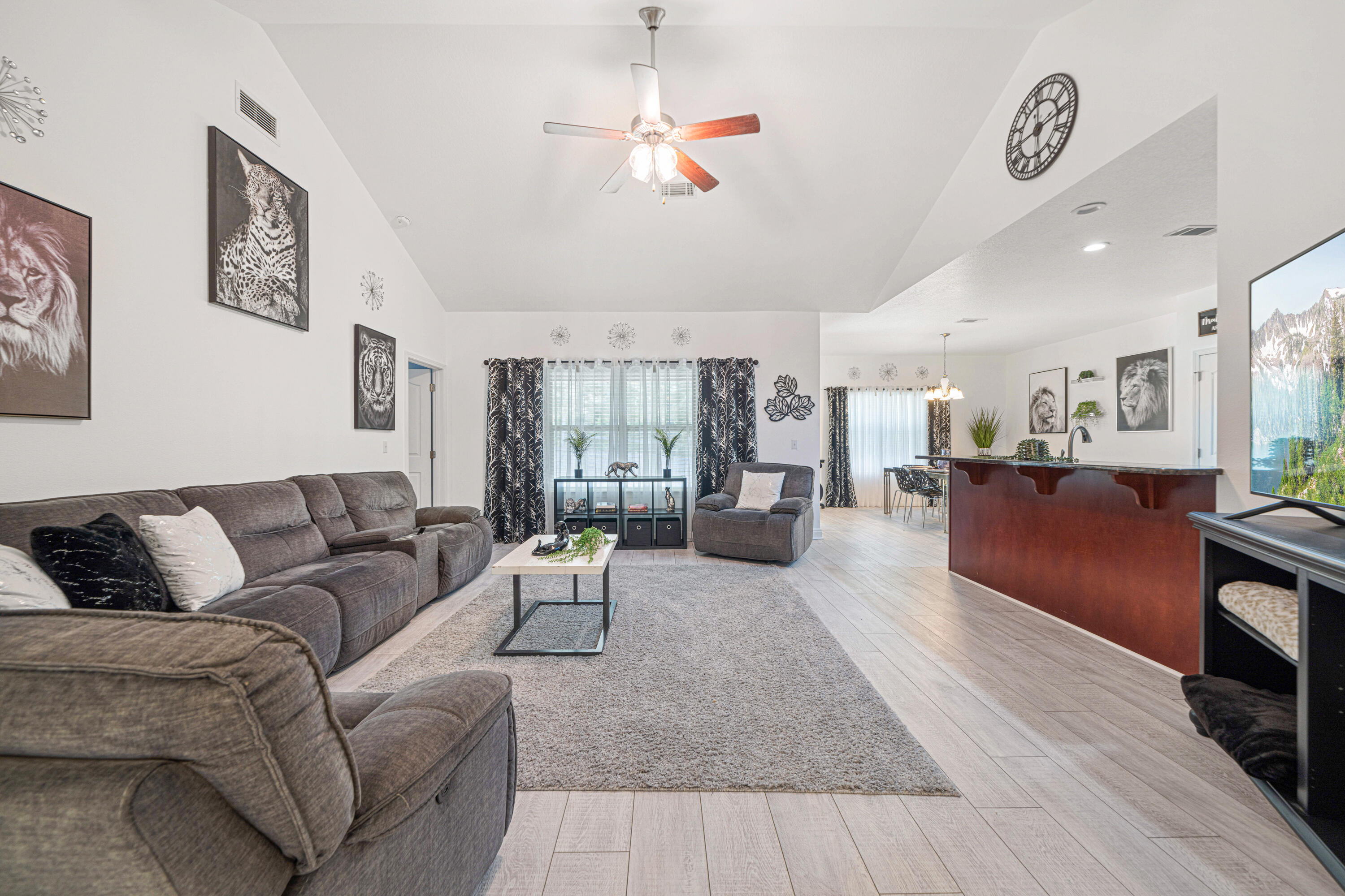 634 Red Fern Road Crestview, FL 32536 - Photo 4 of 21 a living room with furniture kitchen view and a table
