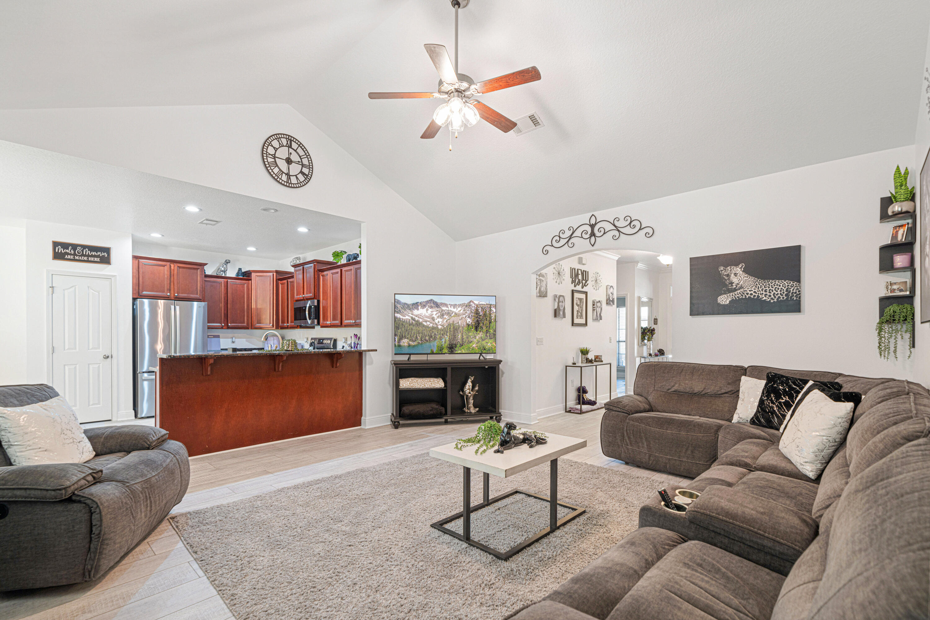634 Red Fern Road Crestview, FL 32536 - Photo 5 of 21 a living room with furniture and a flat screen tv