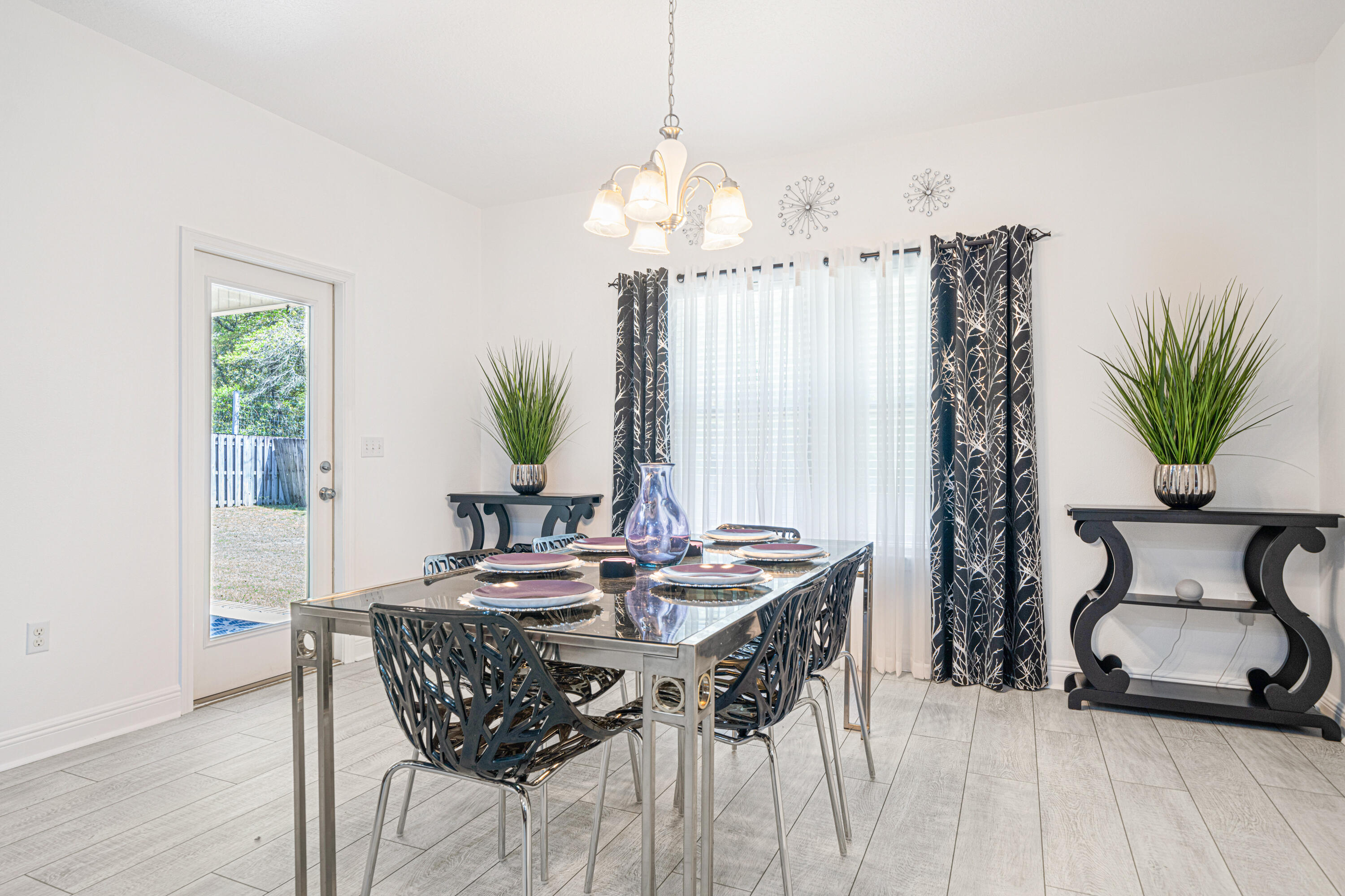 634 Red Fern Road Crestview, FL 32536 - Photo 8 of 21 a view of a dining room with furniture window and outside view