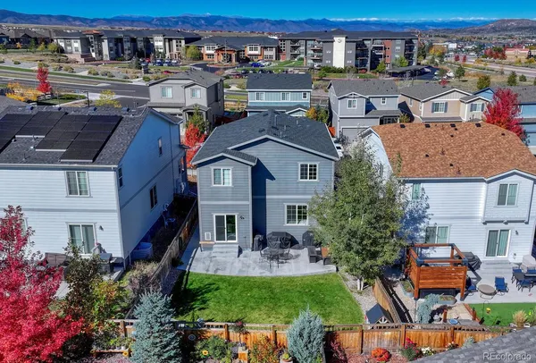 a aerial view of a house with swimming pool