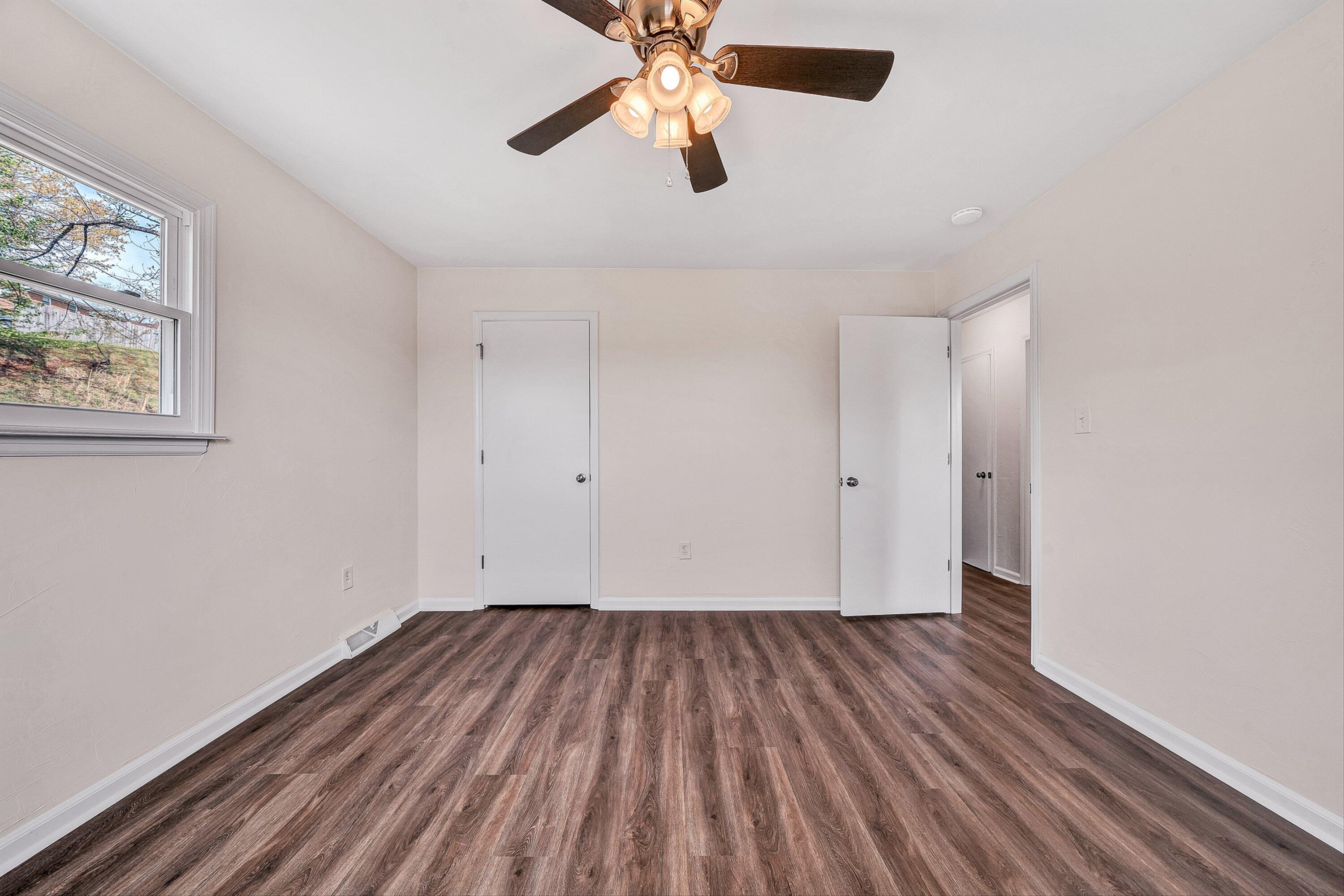 736 Ramada Road Vinton, VA 24179 - Photo 16 of 37 a view of room with hardwood floor and ceiling fan