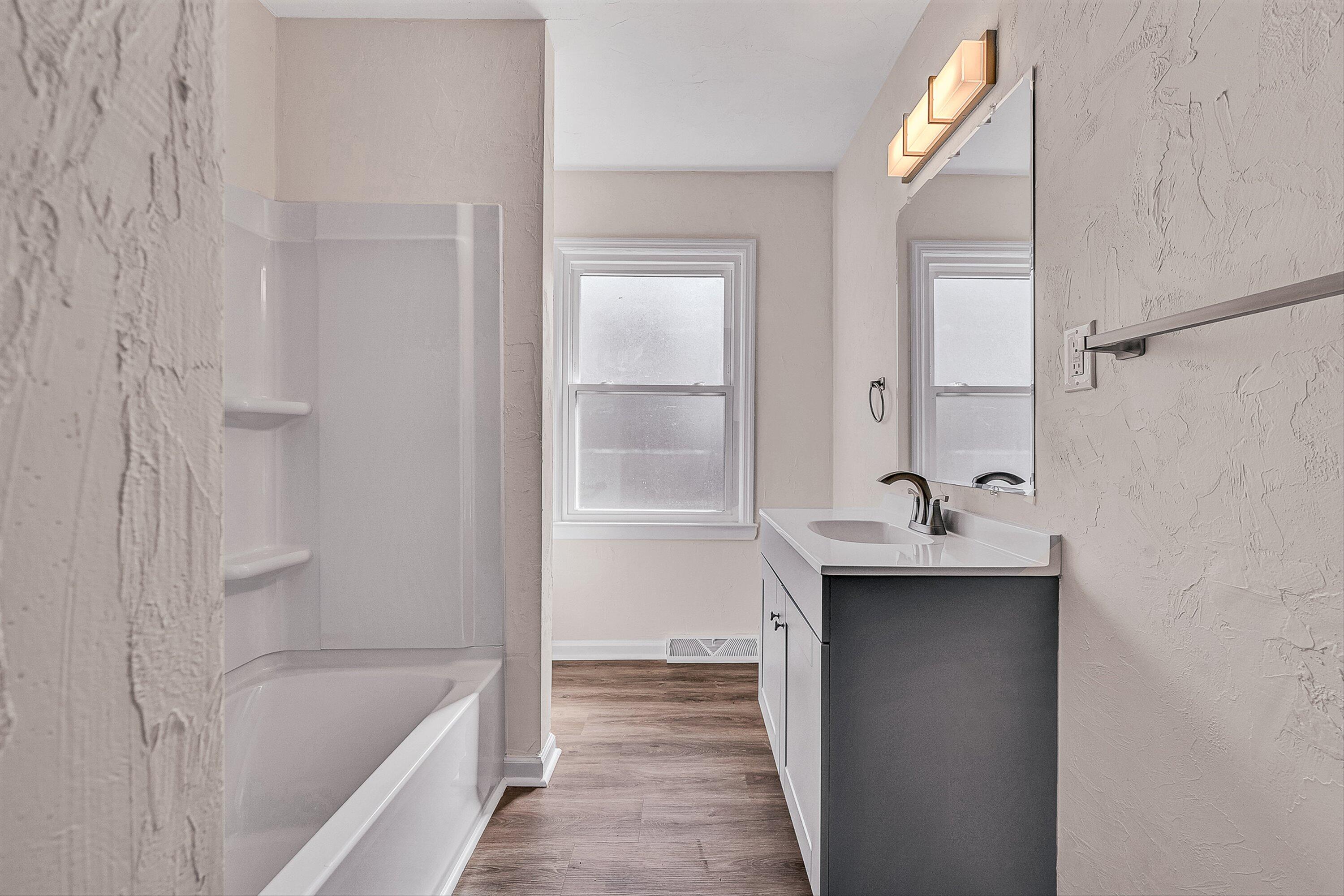 736 Ramada Road Vinton, VA 24179 - Photo 20 of 37 a bathroom with a sink and a bathtub