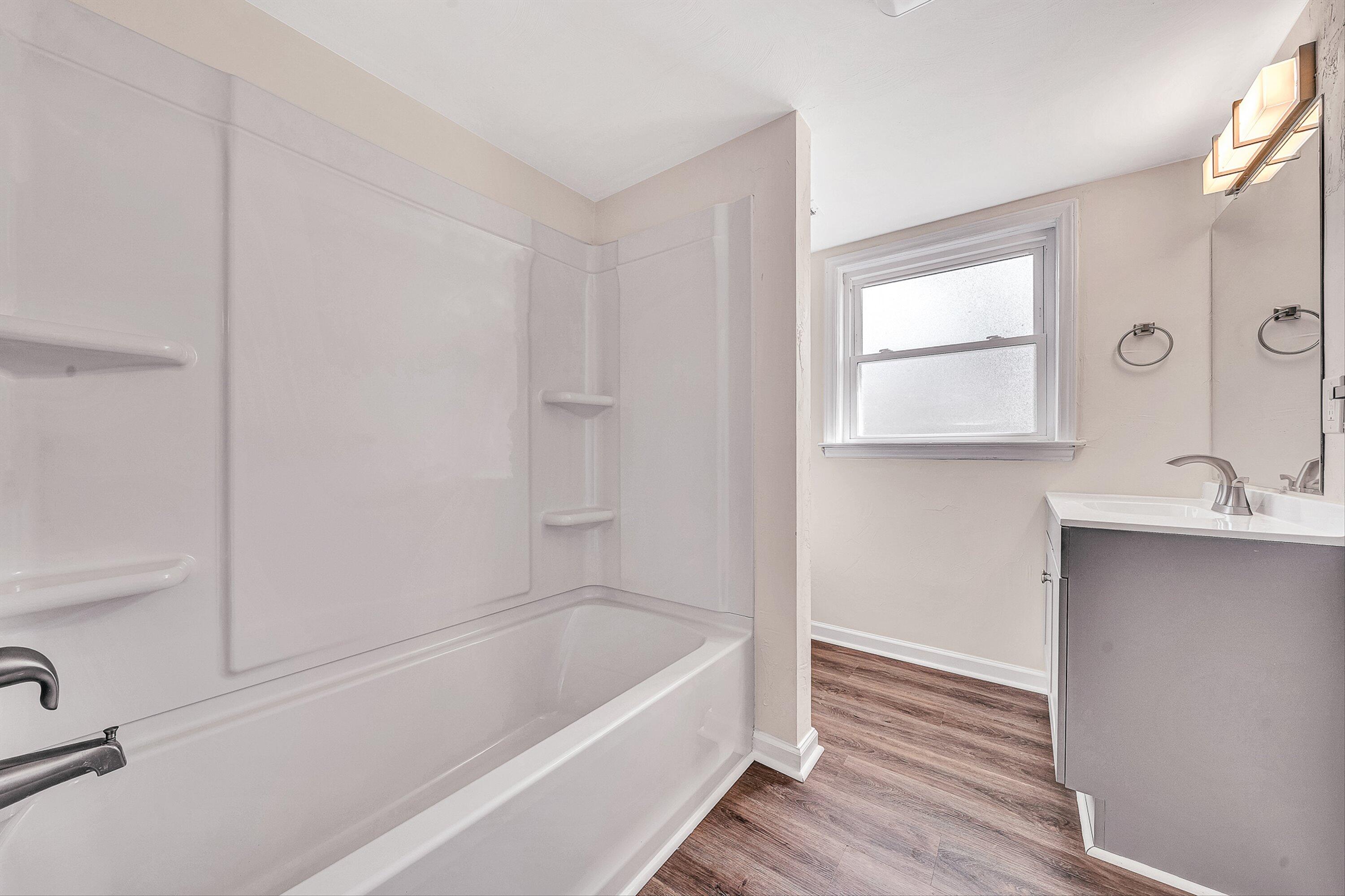 736 Ramada Road Vinton, VA 24179 - Photo 25 of 37 a bathroom with a tub and a sink
