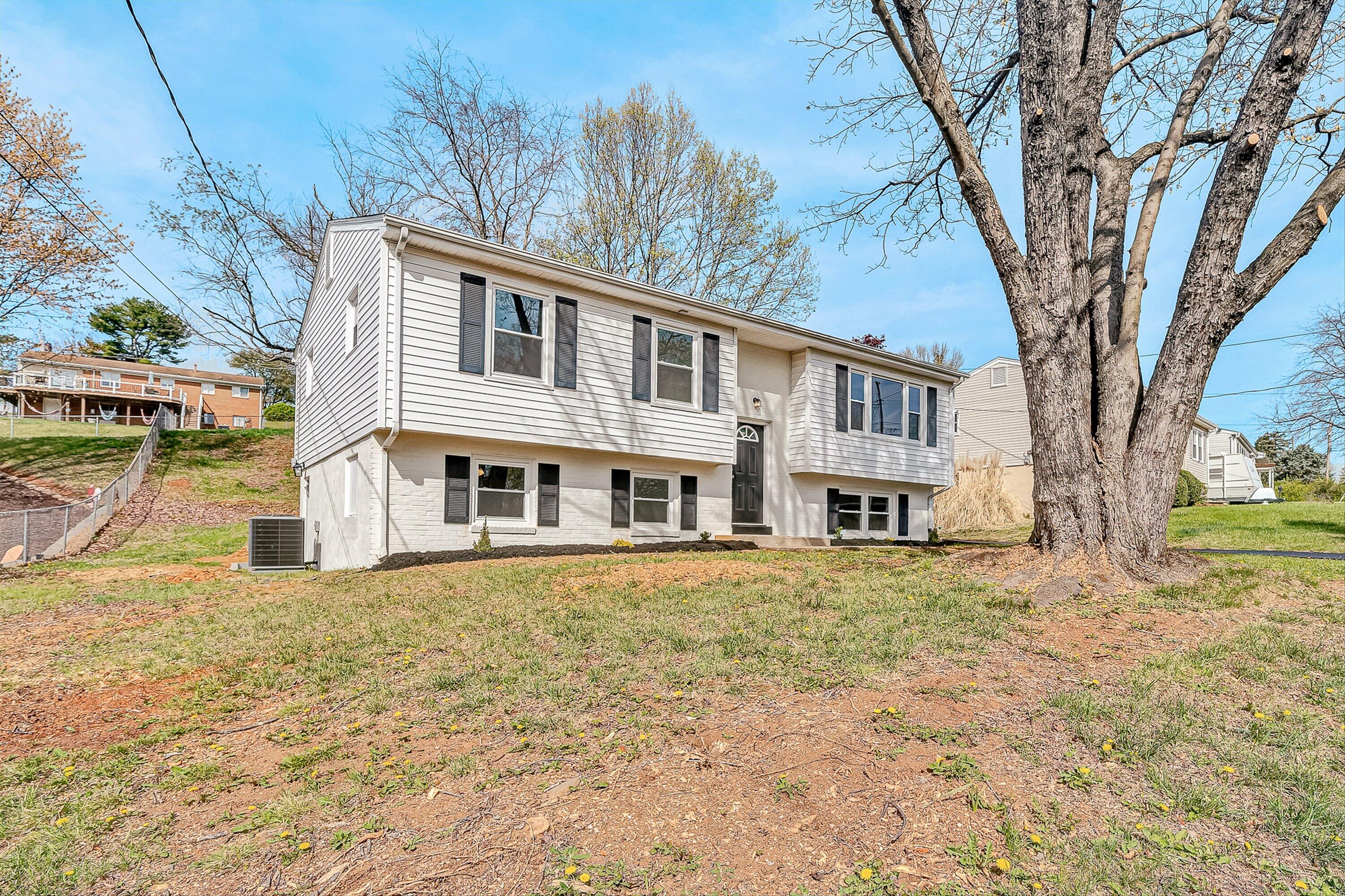 736 Ramada Road Vinton, VA 24179 - Photo 3 of 37 a front view of a house with a yard