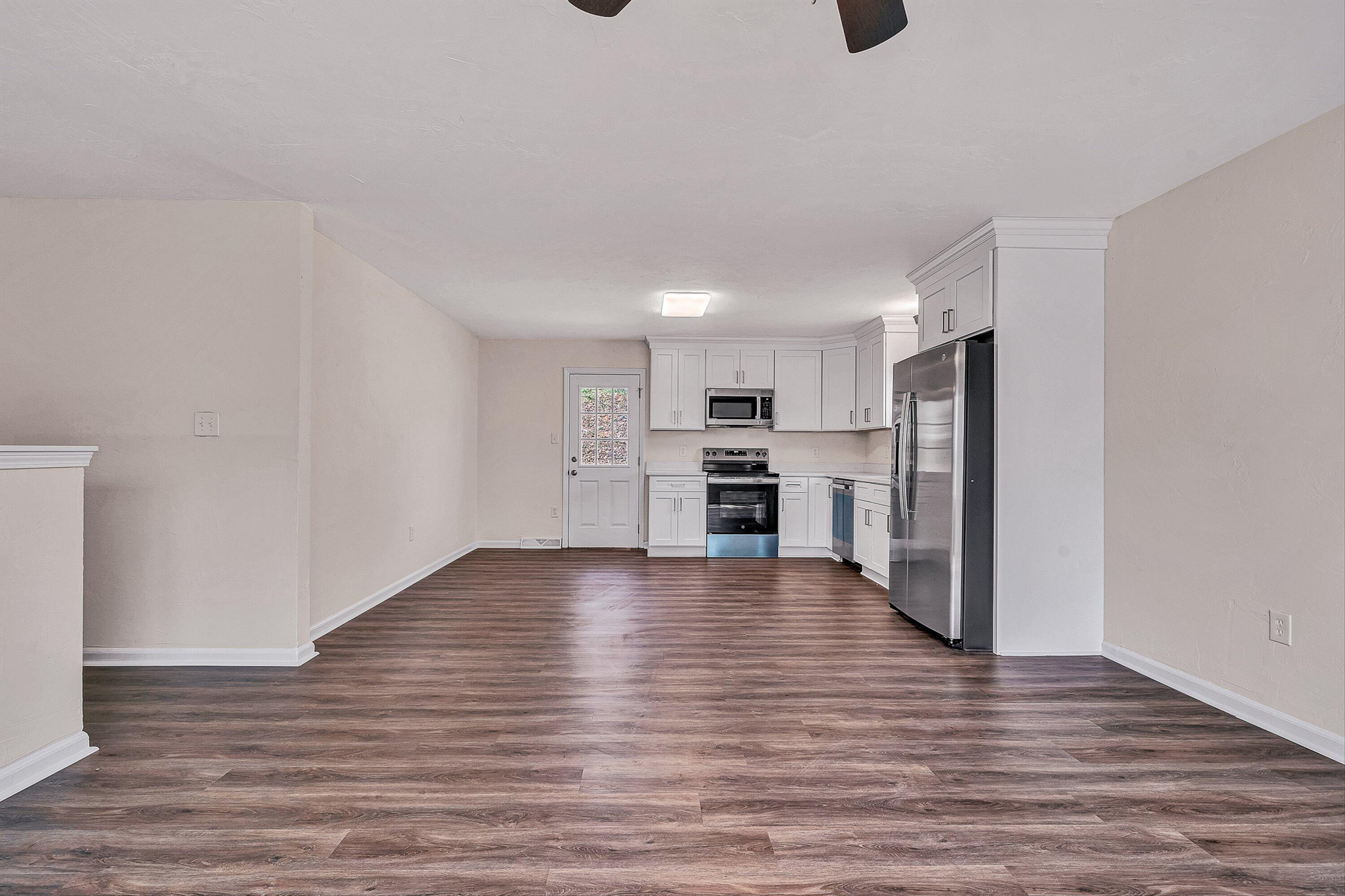 736 Ramada Road Vinton, VA 24179 - Photo 7 of 37 a view of kitchen with wooden floor