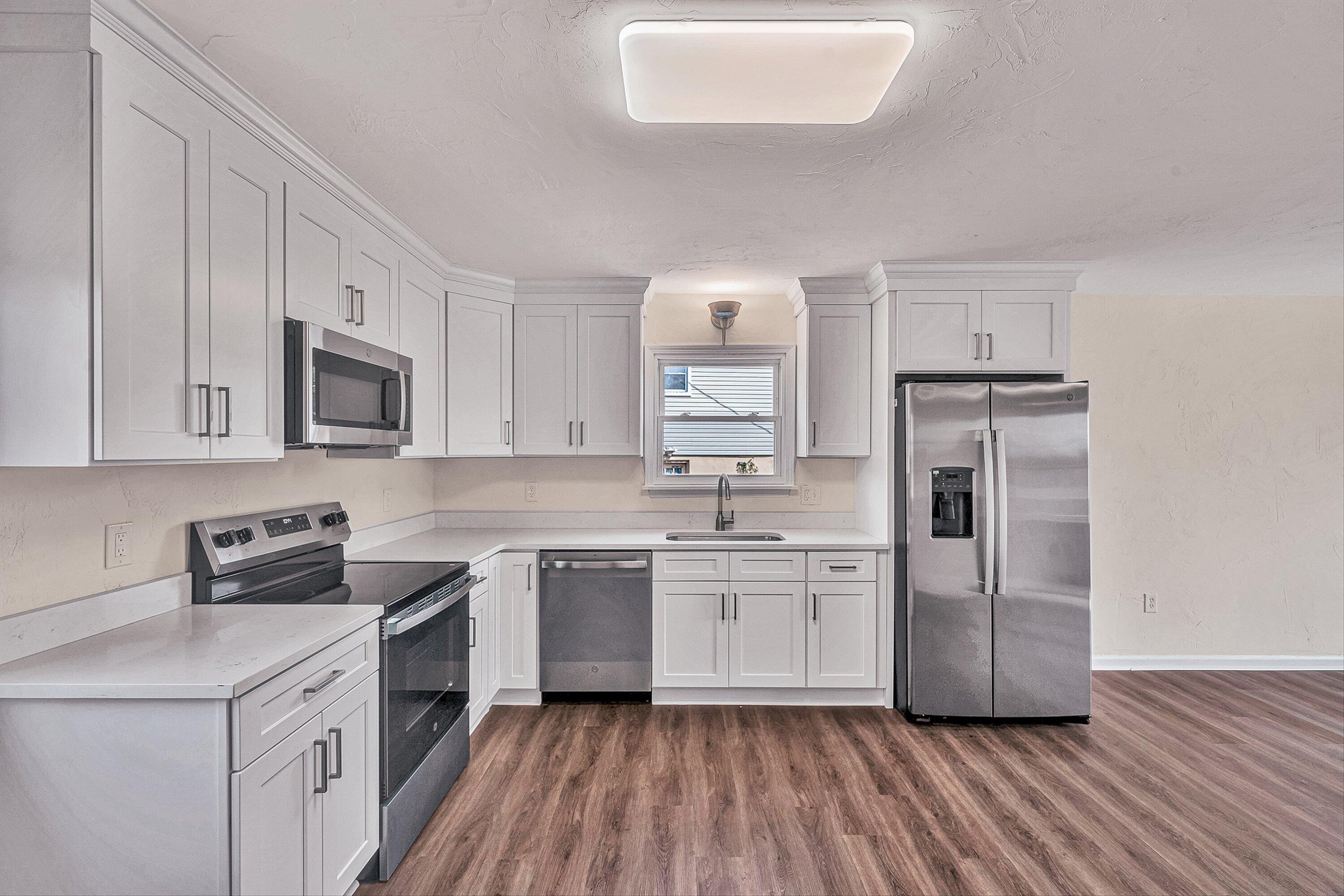 736 Ramada Road Vinton, VA 24179 - Photo 9 of 37 a kitchen with a sink stove and refrigerator