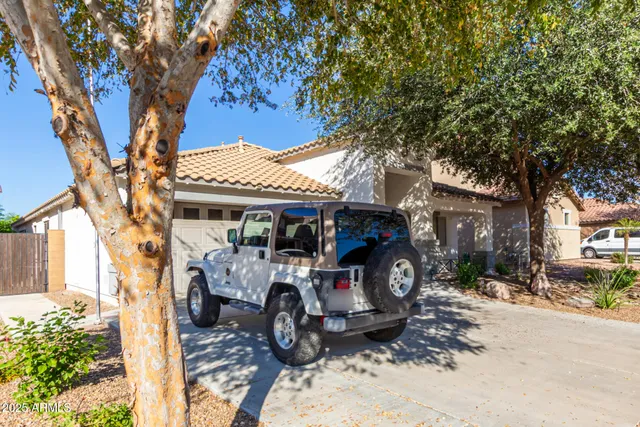 a car parked in front of a house