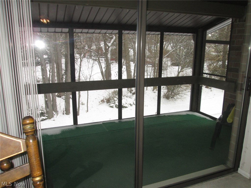 22958 Maple Ridge Road, Unit 208 North Olmsted, OH 44070 - Photo 19 of 35 Enclosed screened in porch(8 x 14) off of the living room.