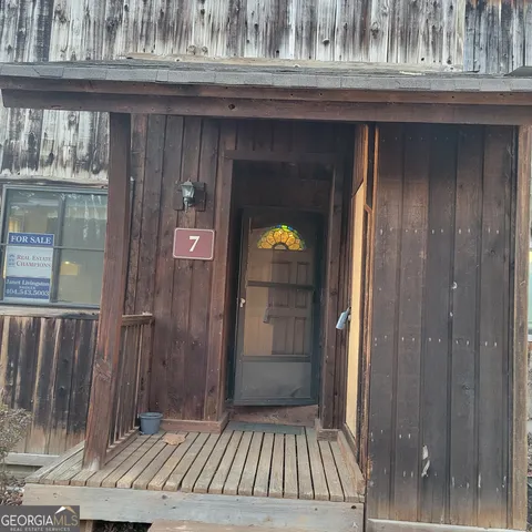 a view of livingroom with furniture and window