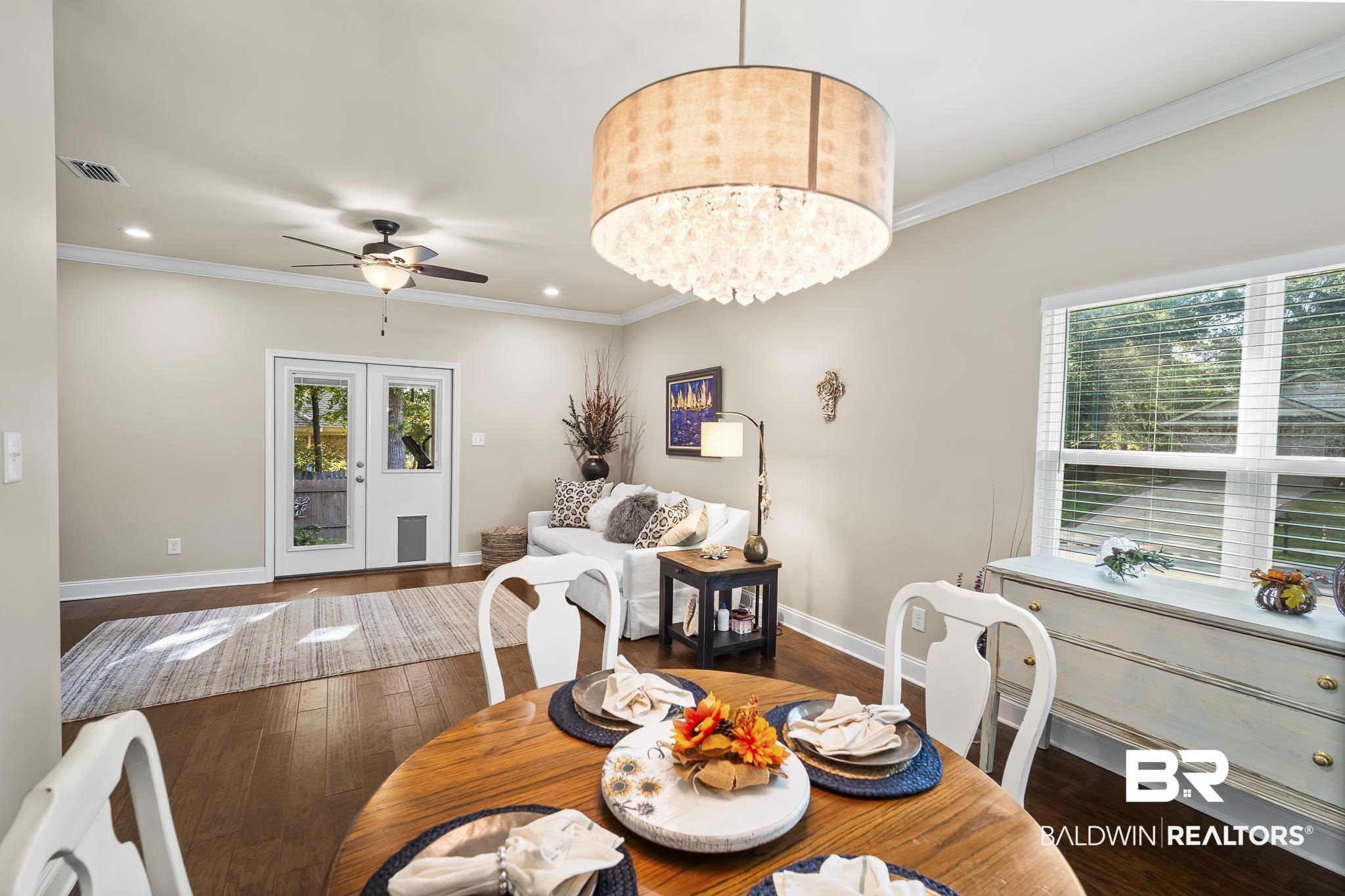 113 Timberline Drive Daphne, AL 36526 - Photo 16 of 44 Dining room with ornamental molding, a chandelier, wood finished floors, ceiling fan, and recessed lighting