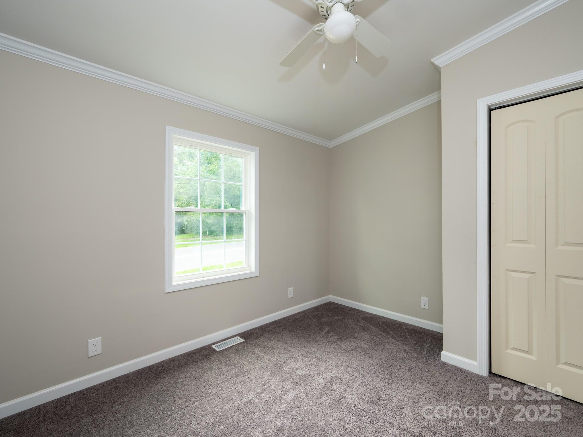 6458 Hudlow Road Union Mills, NC 28167 - Photo 5 of 16 an empty room with a window