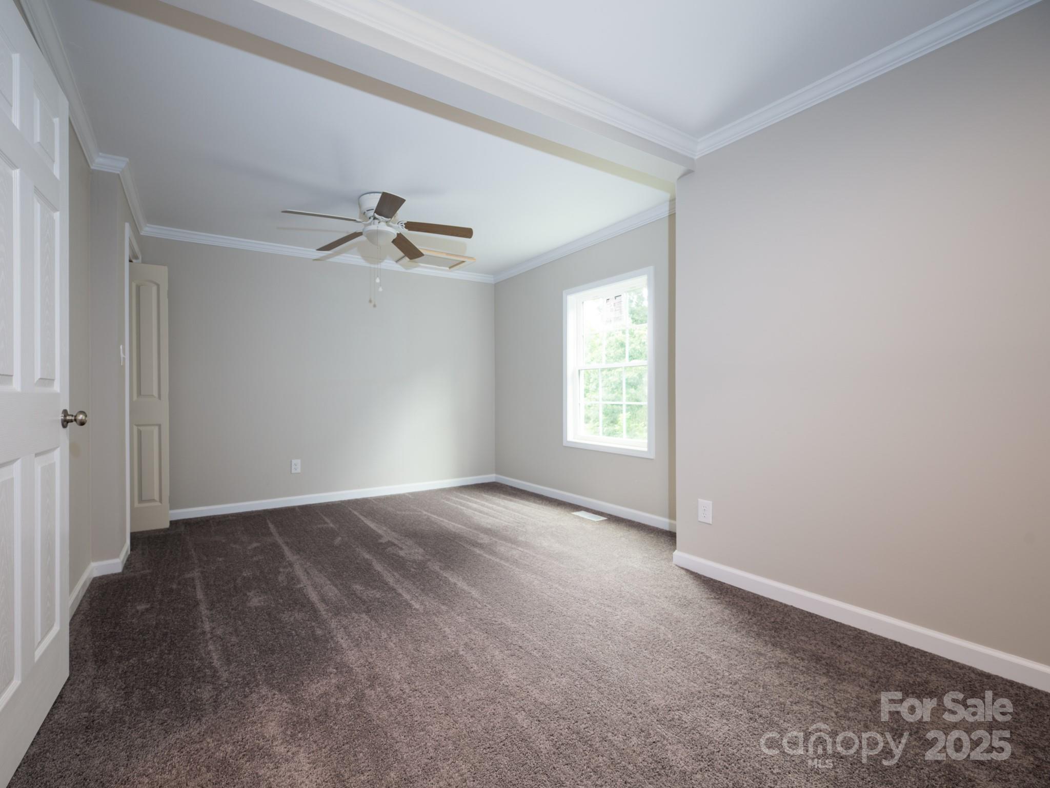 6458 Hudlow Road Union Mills, NC 28167 - Photo 9 of 16 an empty room that has a window in it
