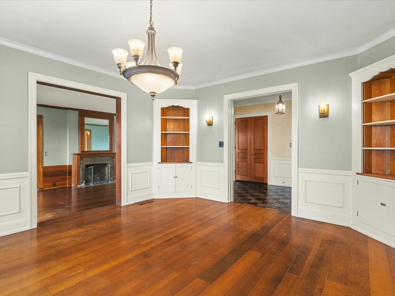 2014 Glenview Road Rockford, IL 61107 - Photo 11 of 82 an empty room with wooden floor cabinet and windows