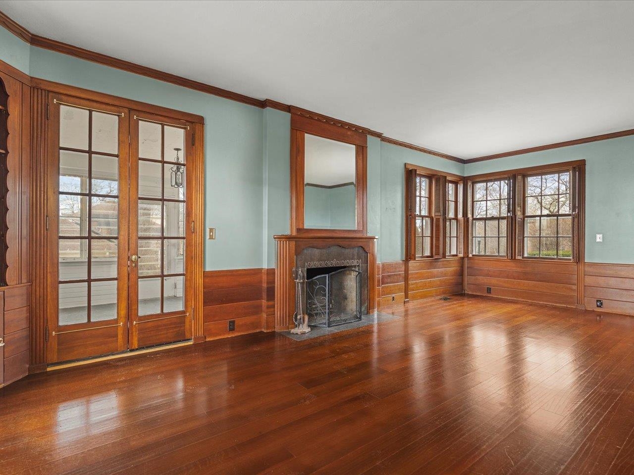 2014 Glenview Road Rockford, IL 61107 - Photo 16 of 82 a view of an empty room with wooden floor and a window